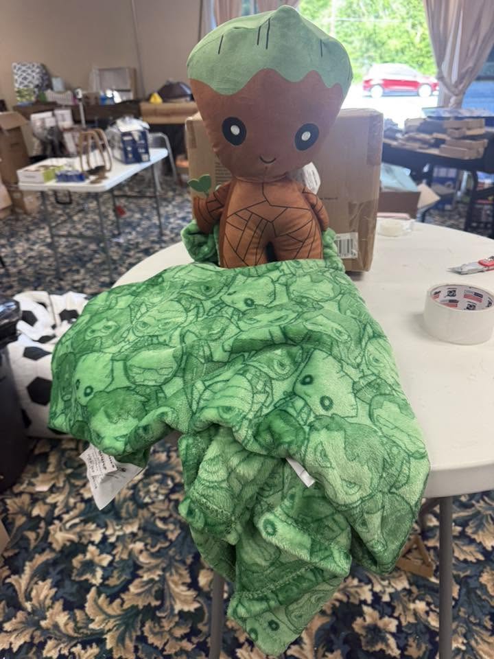 Plush toy with a matching blanket