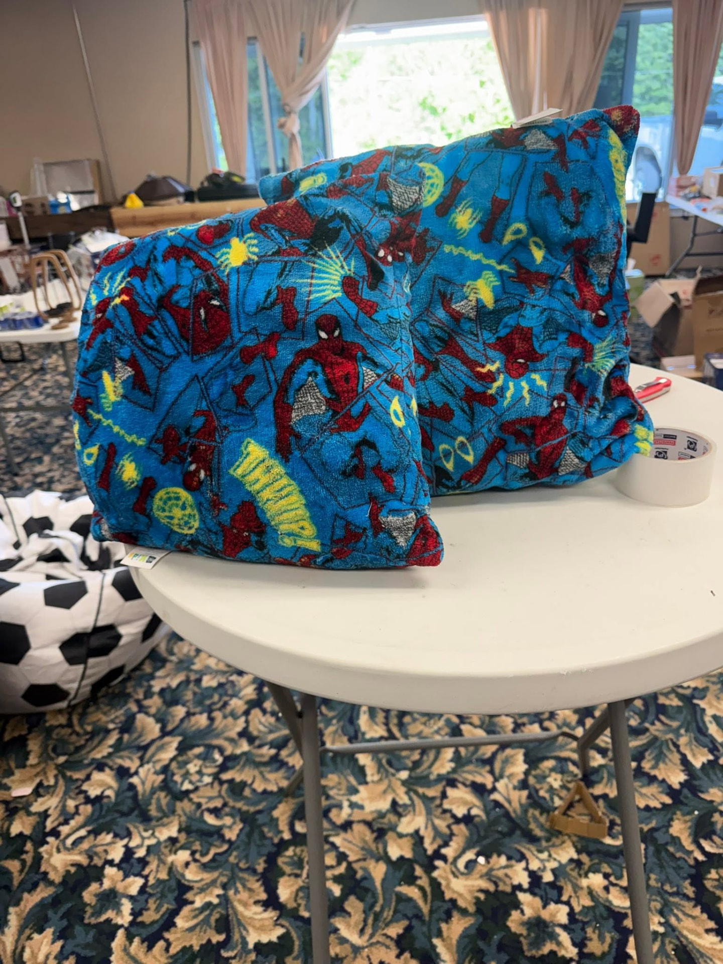 Patterned character pillows on a table