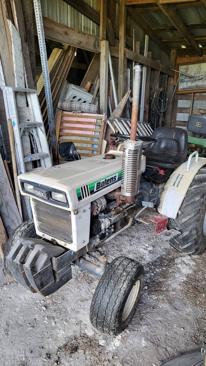 Riding mower in a barn, from the October 24, 2026 sale listing
