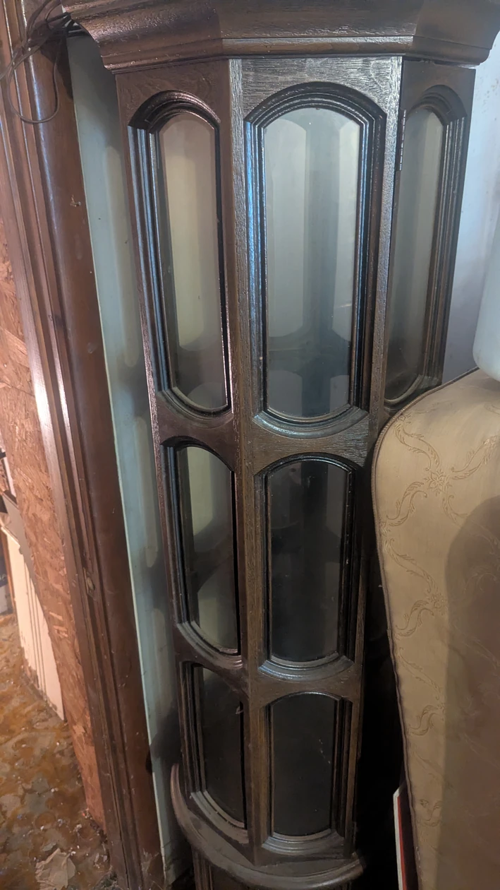 Glass-front curio cabinet, from the Angotti Estate listing