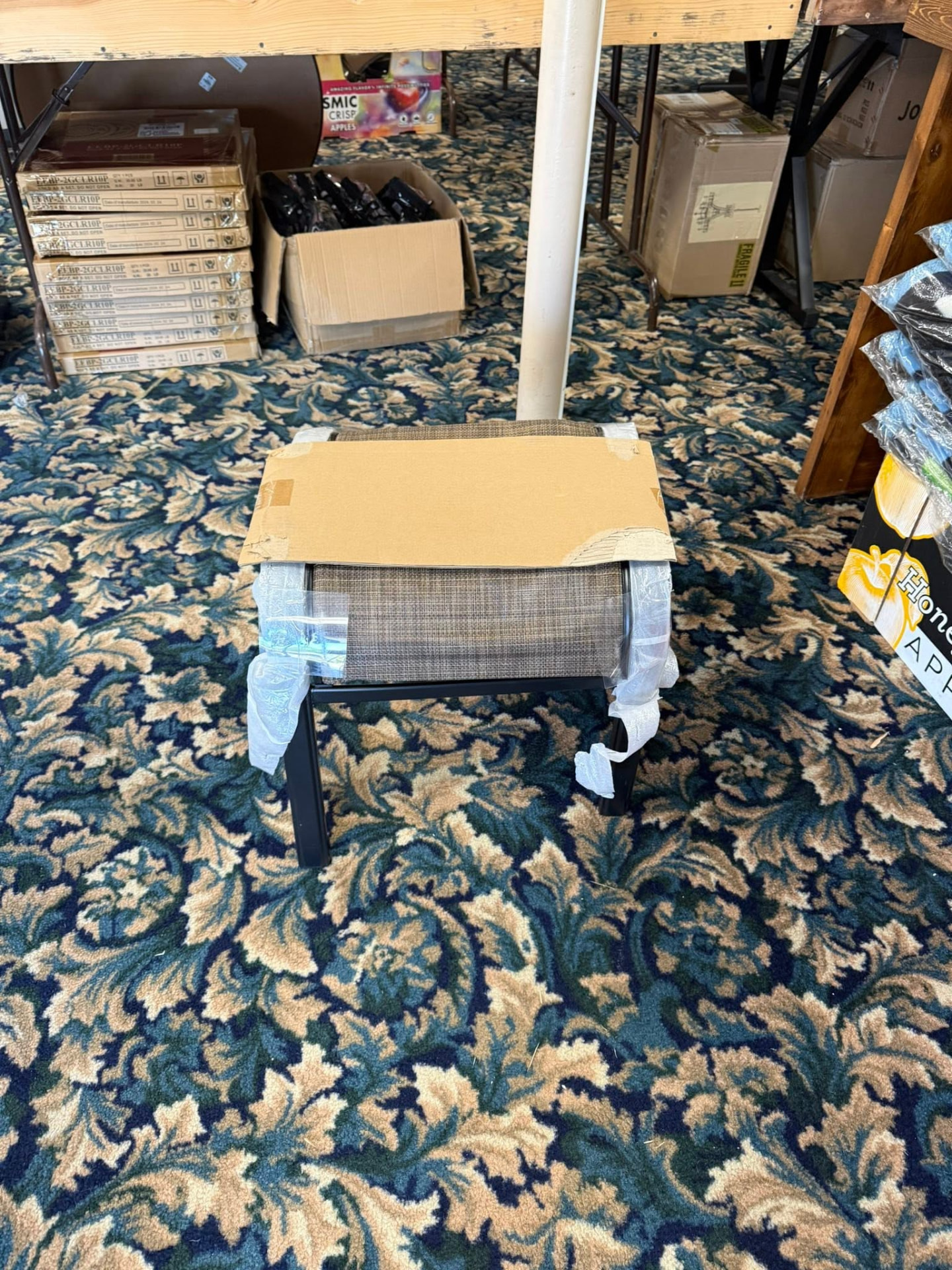 Boxed furniture and merchandise in the Nullys auction room